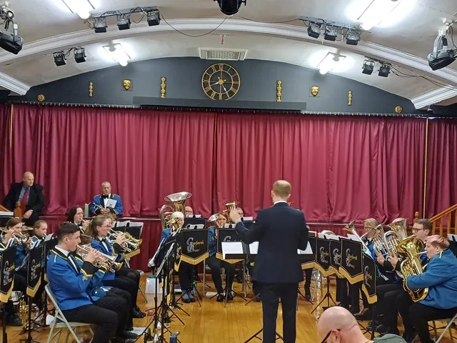 The training band performing at the Chairman's Charity Concert, October 2025.