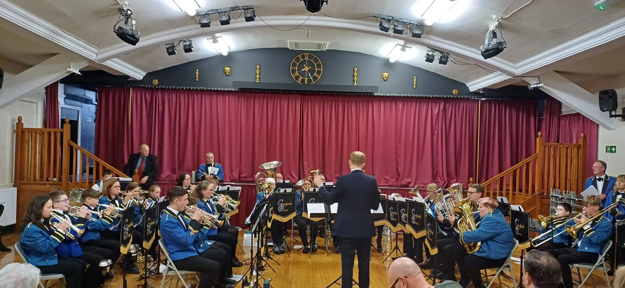 The training band performing on stage.